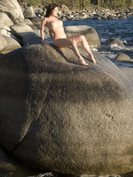 Mermaid Oleen Presenting On The Rock