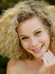 Cute curly-haired blonde Helena