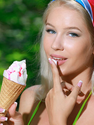 Sexy blonde bombshell Genevieve Gandi licks her ice cream
