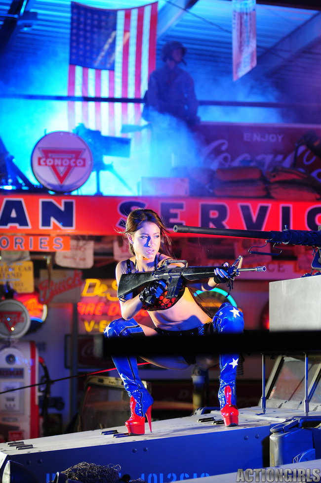 Kristina Walken Posing With A Gun 00