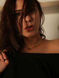 gorgeous brunette in a sexy black dress 01